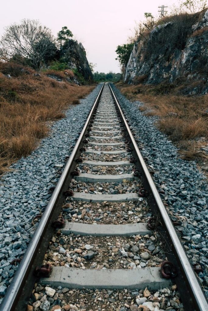 pexels photo 3724910 Picturesque view of railway tracks surrounded by nature in Kanchanaburi, Thailand.